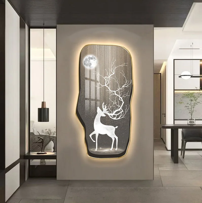 Illuminated wall art featuring a deer and moon design in a modern home setting.