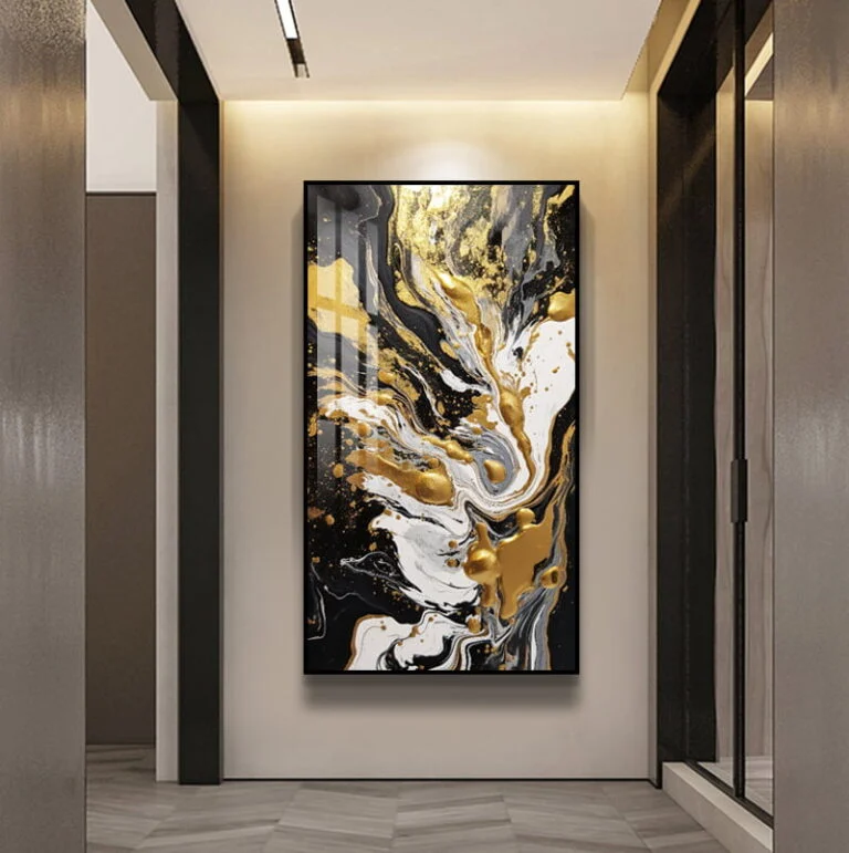 Modern abstract wall art with gold, black, and white swirls in a hallway.