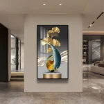 Modern luxury wall art with gold and blue abstract design in a contemporary living room.