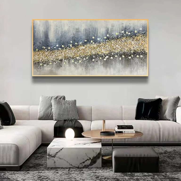 Modern luxury living room with abstract framed wall art and elegant decor.