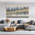 Modern living room with abstract framed wall art and luxury decor.