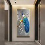 Luxury framed wall art featuring a peacock on a branch with blossoms, perfect for modern home decor.