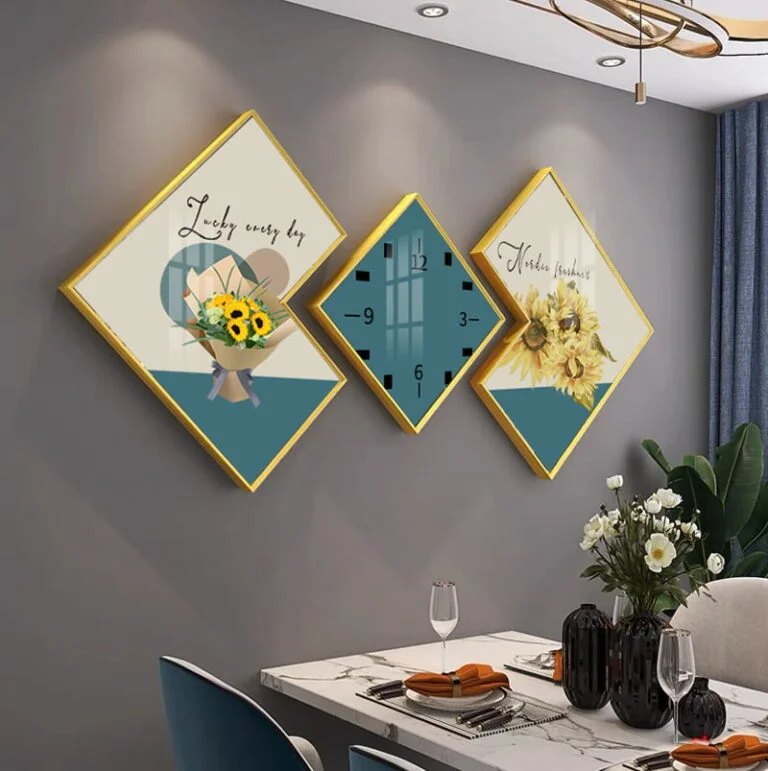 Modern wall art and clock set with floral designs in a dining room.