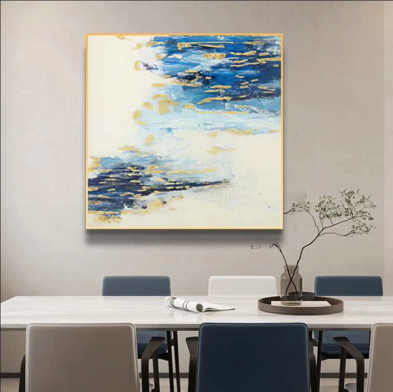 Modern abstract wall art with blue and gold accents in a dining room setting.