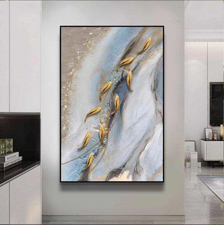 Modern abstract wall art with gold accents in a luxury home setting.