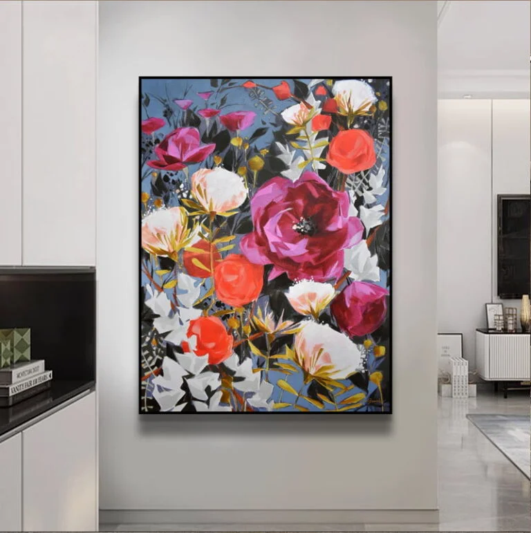 Modern floral wall art with vibrant red and white flowers in a black frame, enhancing luxury home decor.