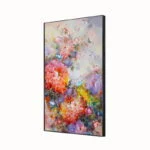 Modern floral wall art with vibrant colors in a sleek black frame.