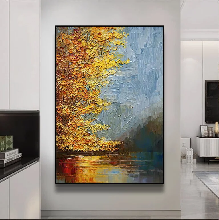 Modern framed wall art with vibrant autumn landscape in a luxury home setting.