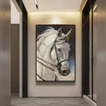 Modern framed wall art of a white horse in a luxury home setting.