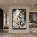 Modern framed wall art of a white horse in a luxury home setting.