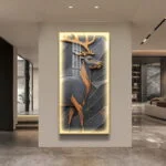 Illuminated modern wall art with deer design in luxury home setting.