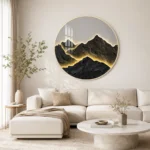 Modern luxury living room with illuminated mountain wall art and neutral decor.