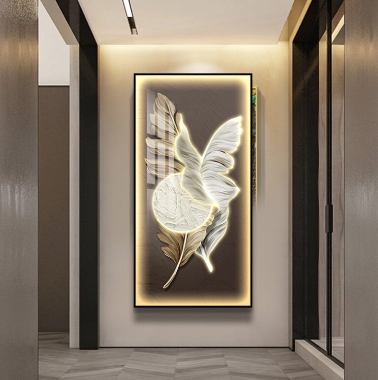 Illuminated modern wall art with leaf design in a hallway setting.