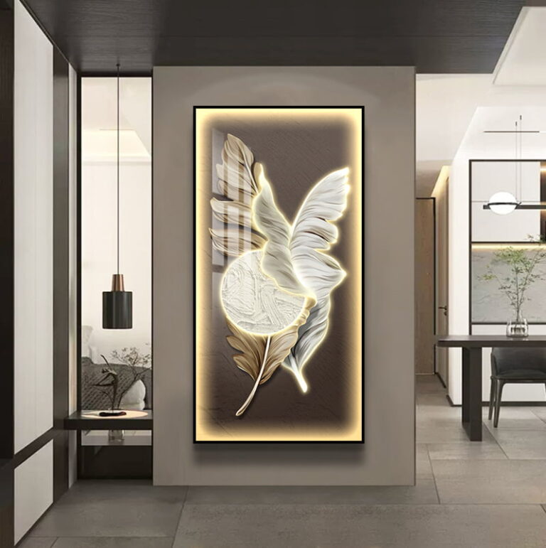 Illuminated modern wall art with feather design in a luxury home setting.