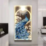 Illuminated wall art featuring a blue peacock with floral accents, perfect for modern luxury home decor.