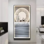 Modern illuminated wall art with deer and abstract design in a luxury home setting.