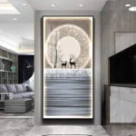 Modern illuminated wall art with deer and abstract design in a luxury living room.