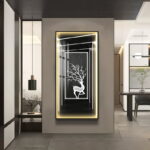 Modern illuminated wall art with deer design in a luxury home setting.