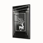 Illuminated wall art with a deer design in a modern black frame.