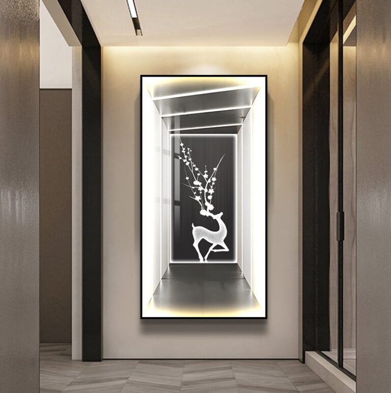 Illuminated modern wall art with deer design in a hallway.