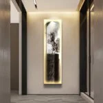 Illuminated modern wall art with horse sculpture in a hallway.