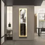 Modern illuminated wall art with abstract design in a luxury home setting.