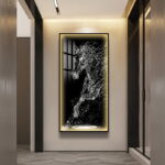 Modern illuminated wall art featuring a horse design in a luxury home setting.