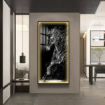 Modern illuminated wall art with abstract horse design in a luxury home setting.