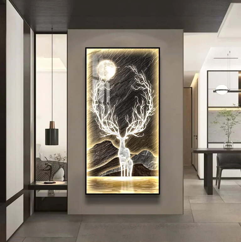 Modern illuminated wall art with a deer and moon design in a luxury home setting.