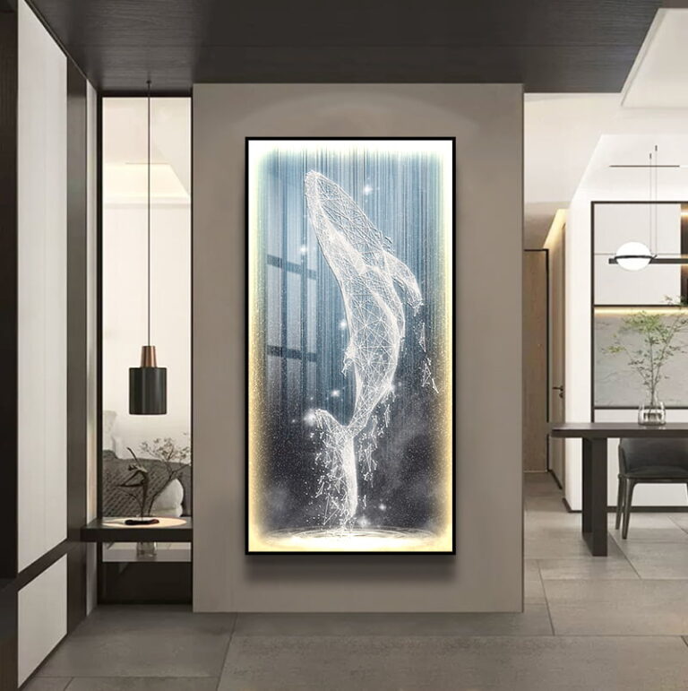 Modern illuminated wall art featuring a jumping whale in a luxury home setting.