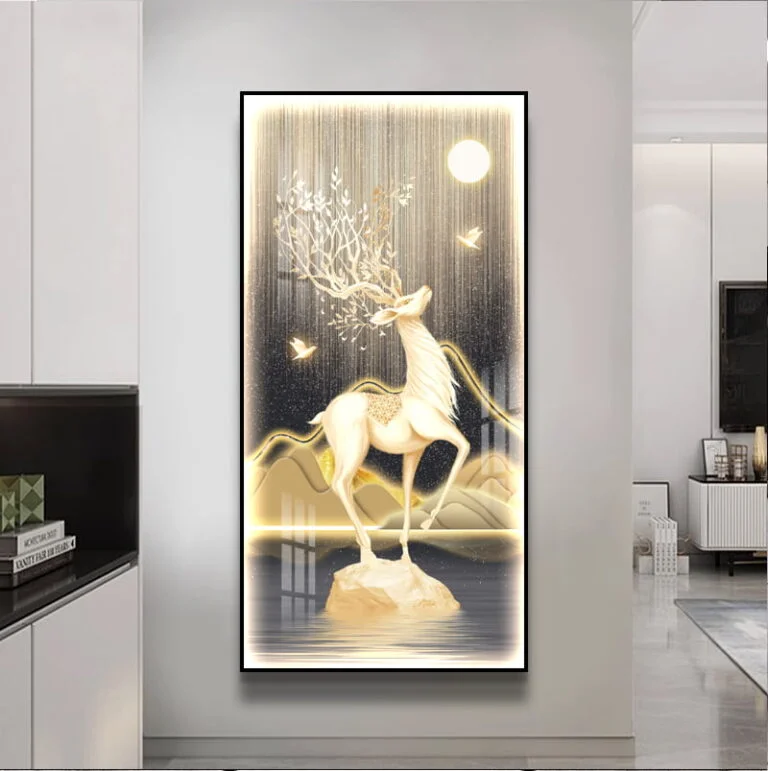Illuminated framed wall art with a deer and nature scene, perfect for modern luxury home decor.