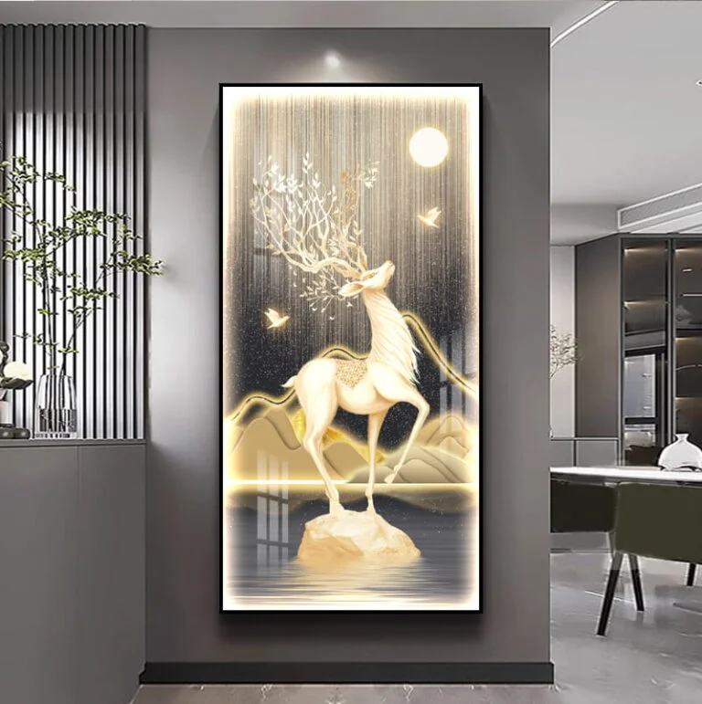 Illuminated wall art featuring a deer with antlers, modern luxury home decor.