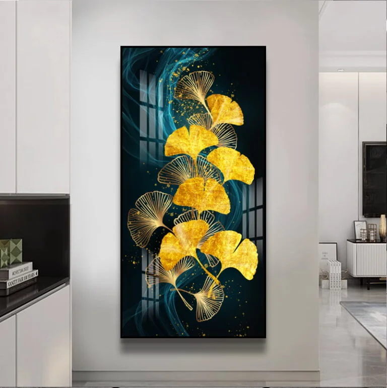 Modern luxury wall art with gold leaf design in a sleek interior setting.