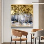 Modern framed wall art with abstract tree design in a luxury home setting.
