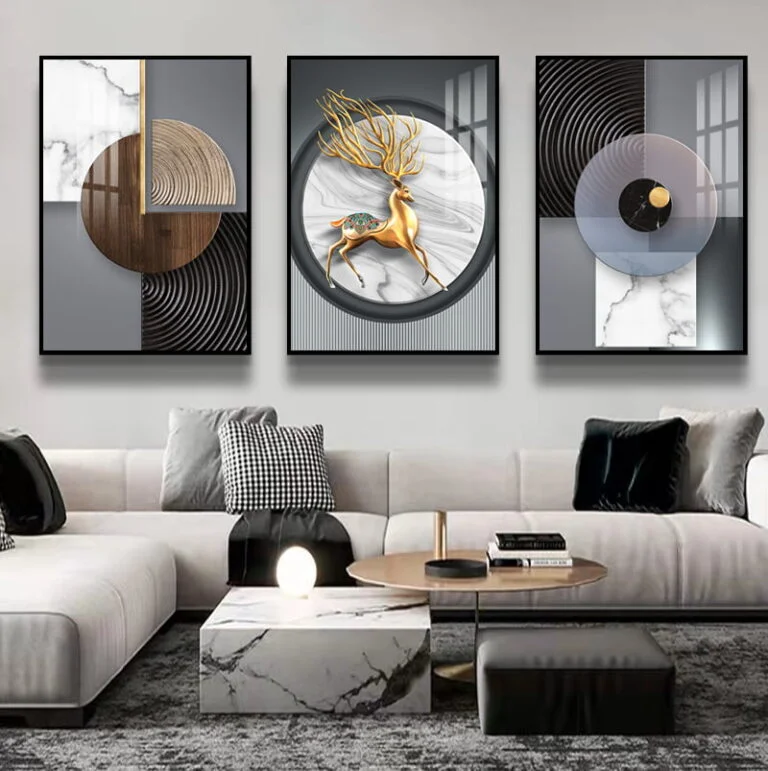 Modern living room with abstract framed wall art and luxury decor.