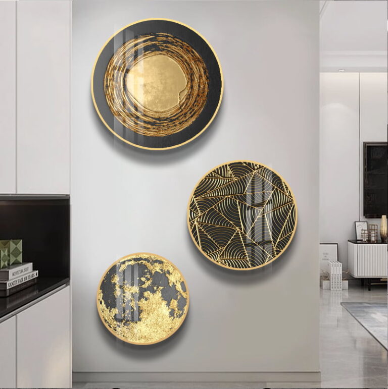 Modern luxury wall art with gold and black circular designs in a contemporary home setting.