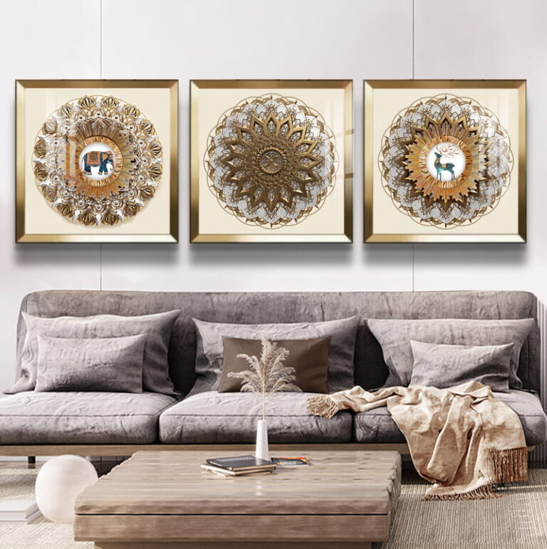 Luxury living room with modern framed wall art featuring intricate Islamic designs above a gray sofa.