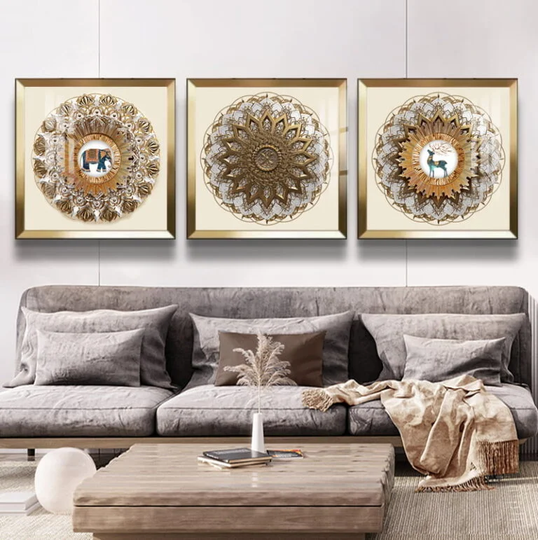 Luxury living room with modern framed wall art featuring intricate Islamic designs above a gray sofa.