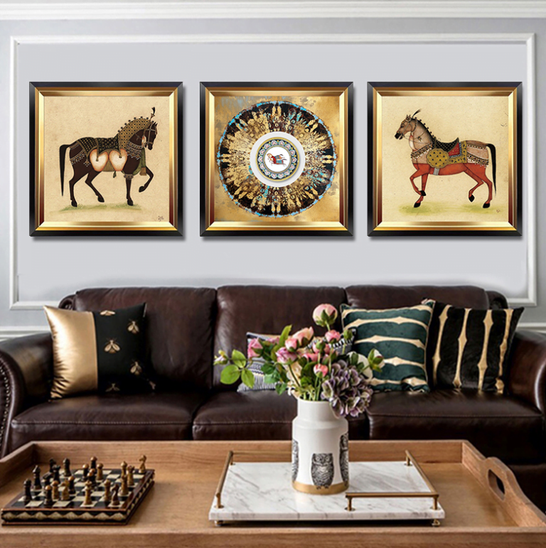 Luxury living room with framed horse art and decorative accessories.