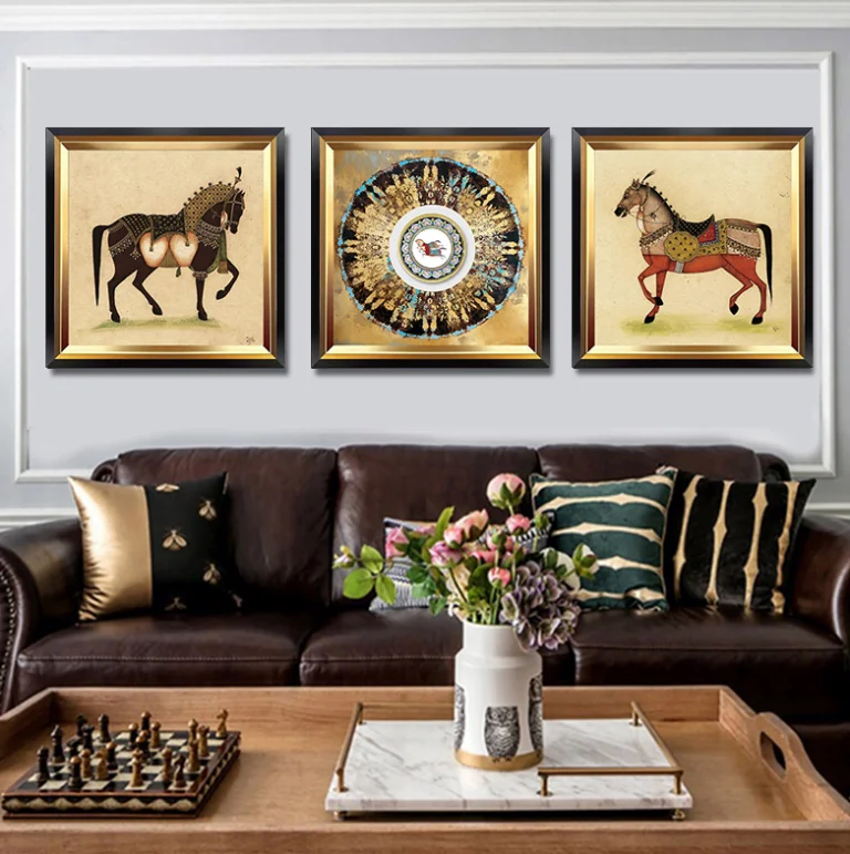 Luxury living room with framed horse art and decorative accessories.