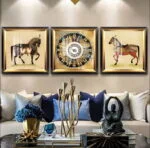 Luxury framed wall art with horse designs and decorative accessories in a modern living room.