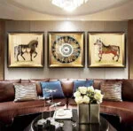 Luxury living room with framed modern wall art and elegant decor.