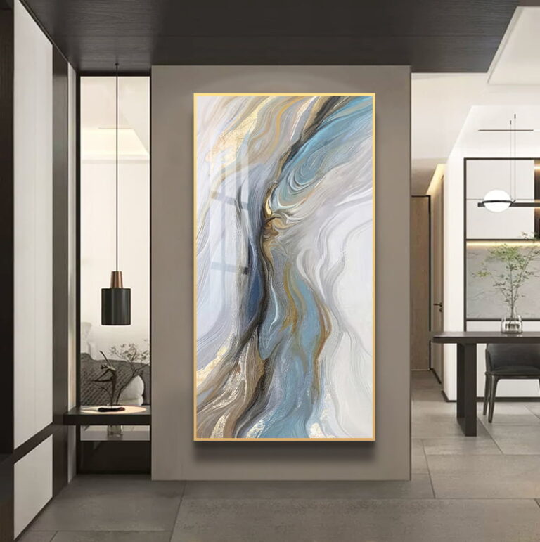 Modern abstract wall art with gold and blue swirls in a luxury home setting.