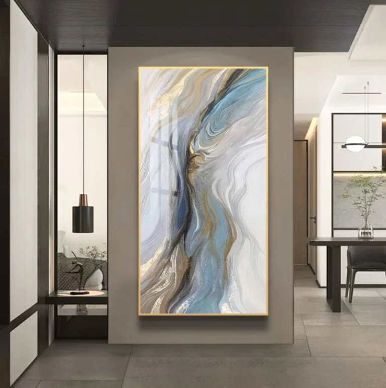 Modern abstract wall art with gold and blue swirls in a luxury home setting.