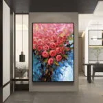 Modern framed wall art with vibrant floral design in a luxury home setting.