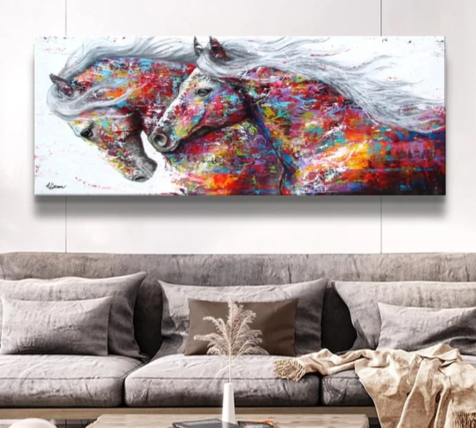Colorful horse-themed modern wall art in a living room setting.
