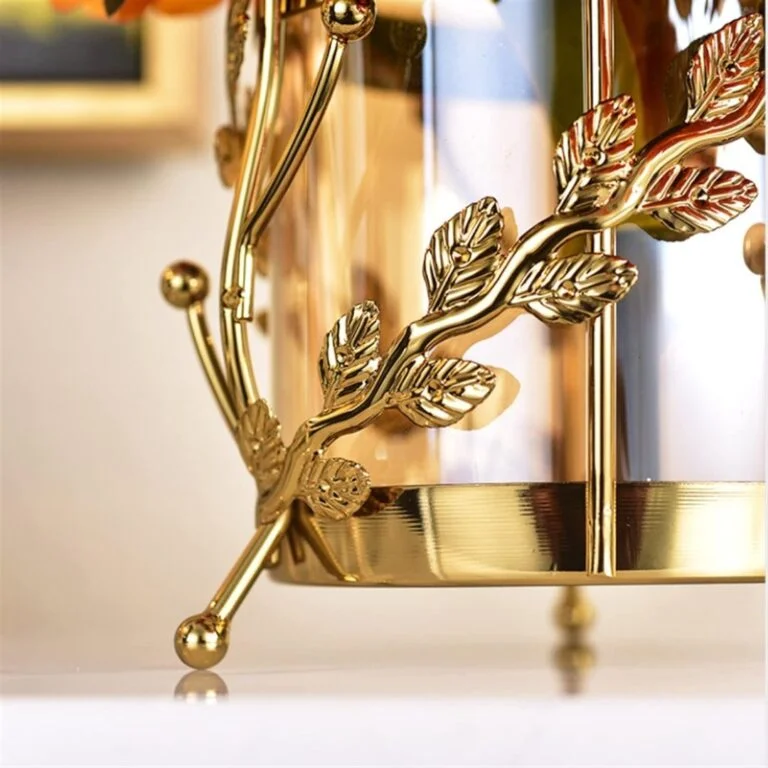 Gold decorative vase with leaf design, modern luxury home decor