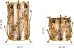 Gold decorative candle holders with leaf design, modern home decor accessories.