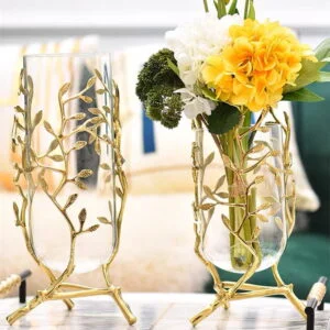 Elegant glass vases with gold branch design, perfect for modern luxury home decor.