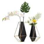 Modern geometric vases with flowers, luxury home decor accent.